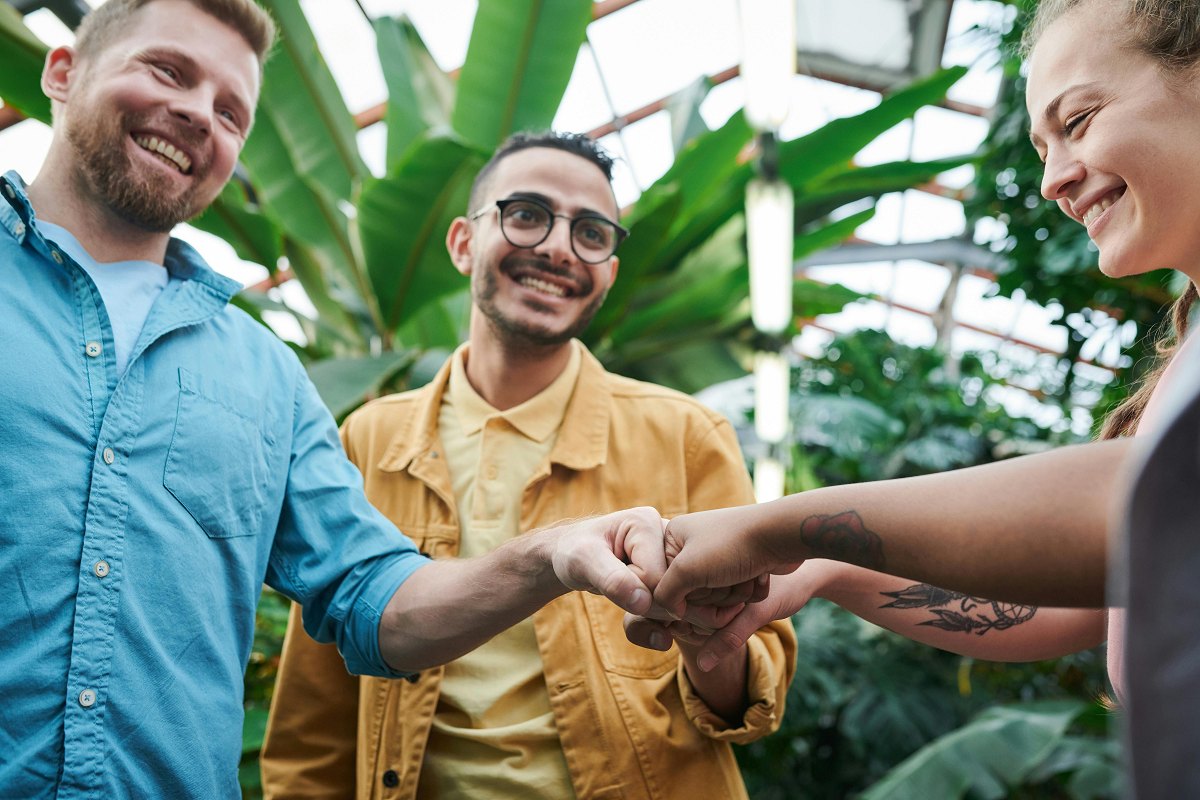 friends giving a fist bump